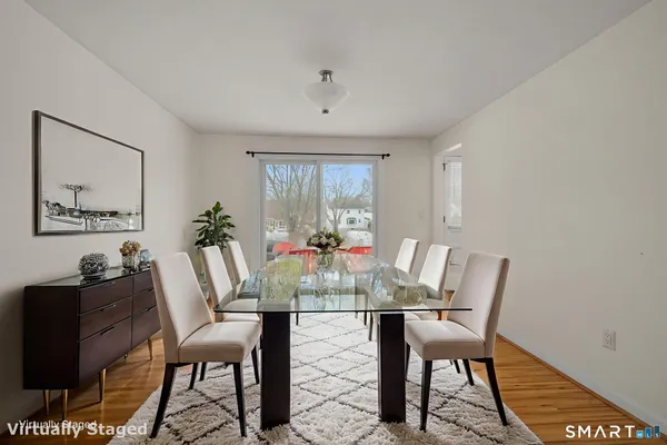 a view of a dining room with furniture