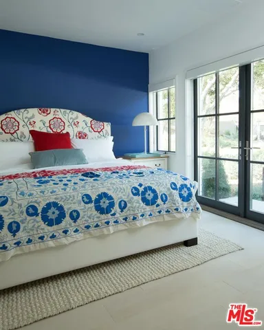 a bed with a bed and a dresser