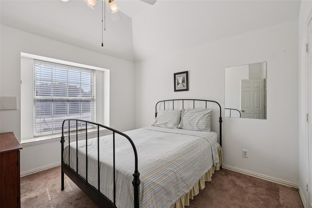 3004 Springfellow Drive Plano, TX 75025 - Photo 23 of 37 a bedroom with a bed and a window