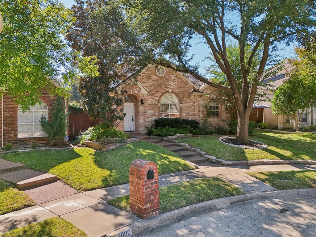 3004 Springfellow Drive Plano, TX 75025 - Photo 34 of 37 a view of a chair and table in the garden