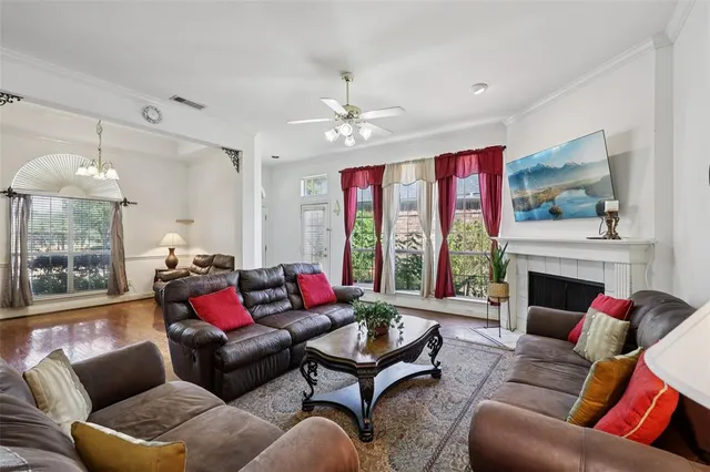 a living room with furniture or outdoor view and a fireplace