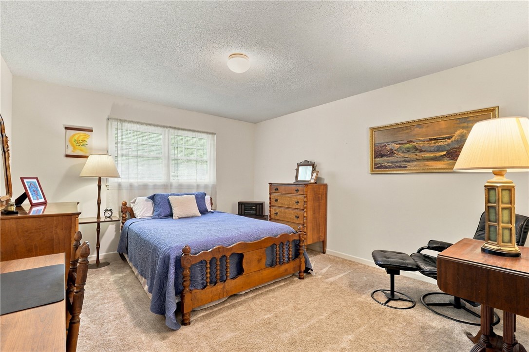 7 Woodbridge Circle Anderson, SC 29621 - Photo 17 of 26 Soft carpeting pairs with neutral walls and classic windows in this peaceful sleeping space.