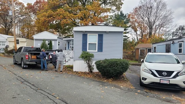 a car parked in front of a house