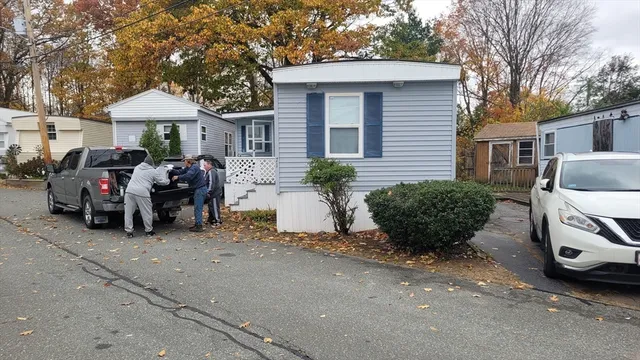 a front view of a house with garage