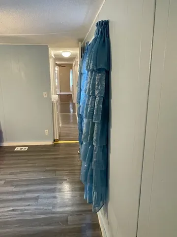 a bathroom with a sink a toilet a mirror and vanity