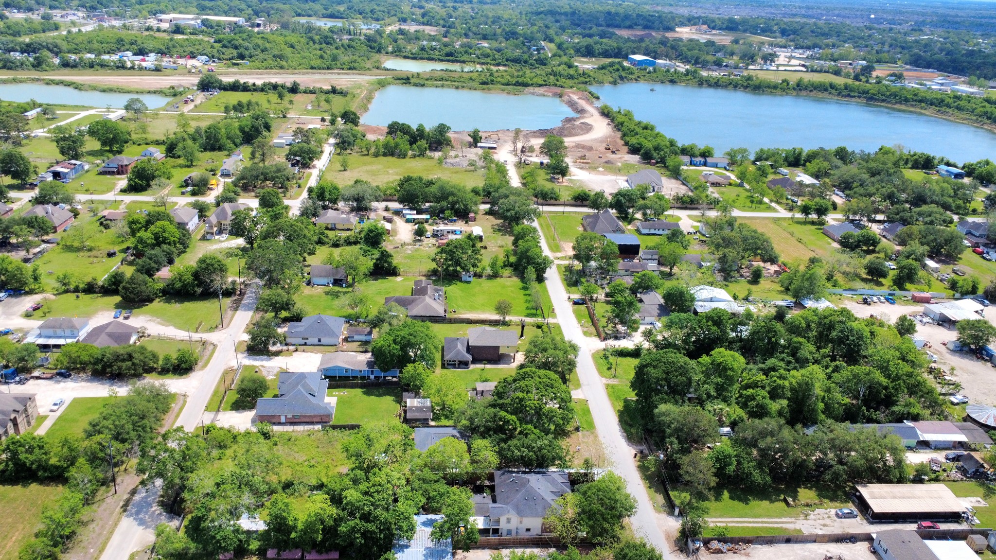 704 Cleo Street Fresno, TX 77545 - Photo 13 of 40 an aerial view of residential houses with outdoor space and lake view
