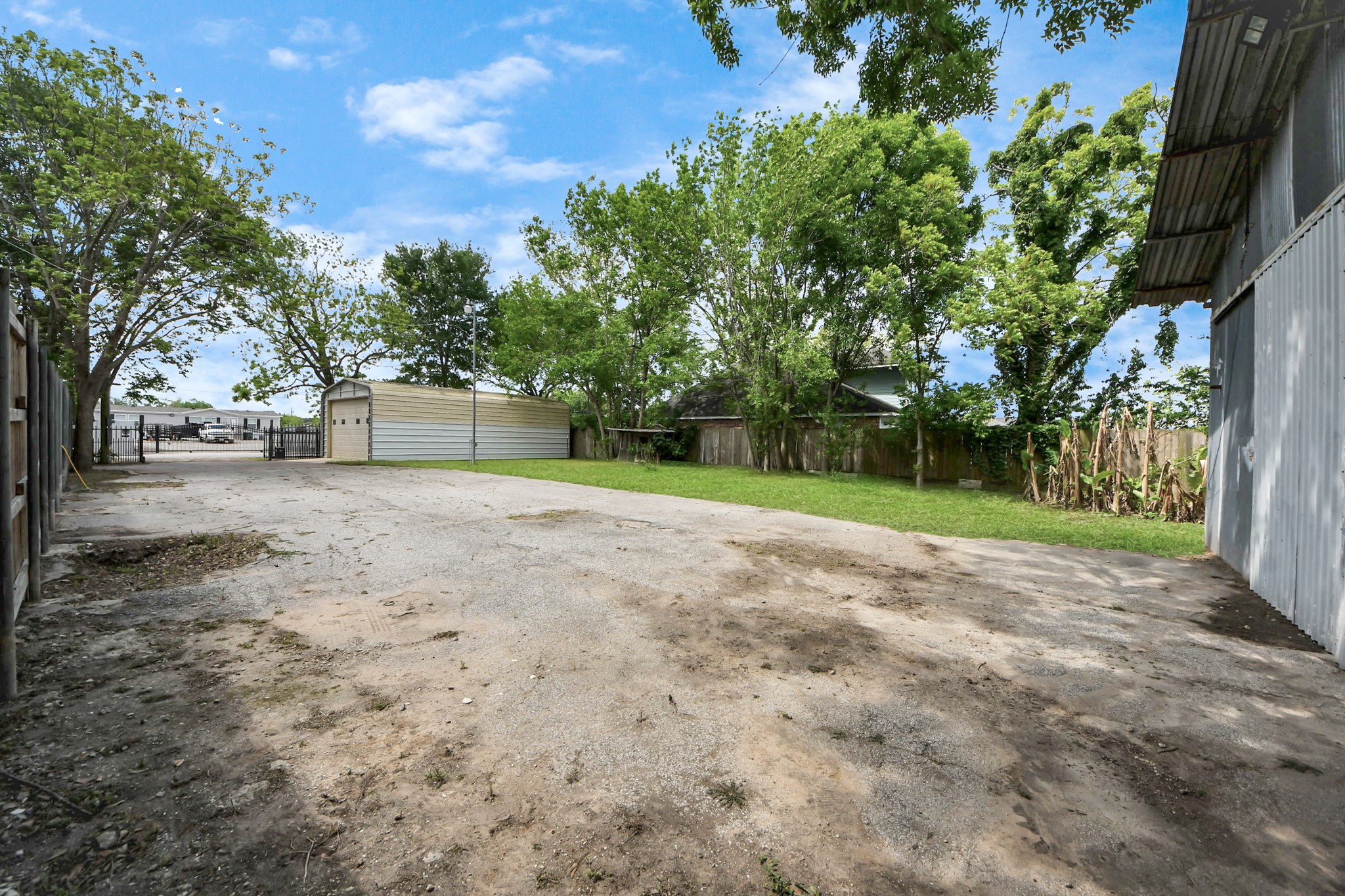 704 Cleo Street Fresno, TX 77545 - Photo 20 of 40 a view of a yard with plants and trees