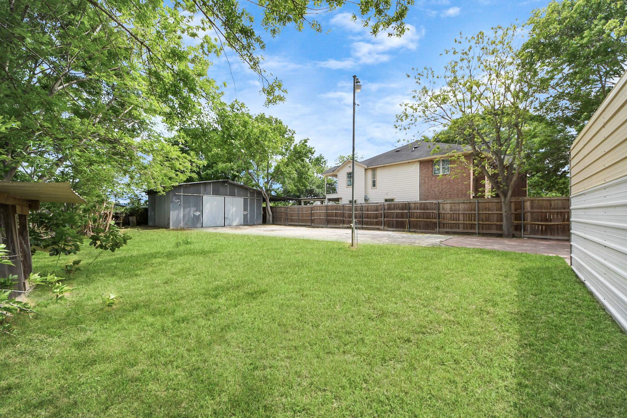 704 Cleo Street Fresno, TX 77545 - Photo 23 of 40 a front view of house with yard and green space