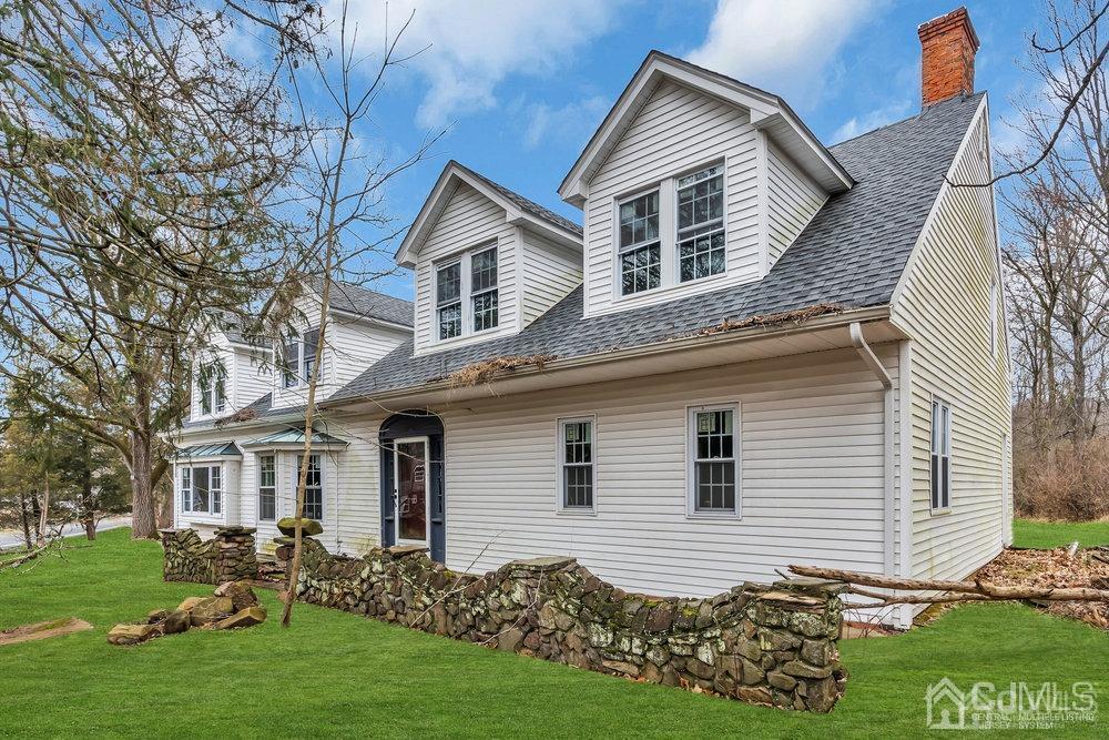700 Foothill Road Bridgewater, NJ 08807 - Photo 2 of 30 a front view of a house with garden