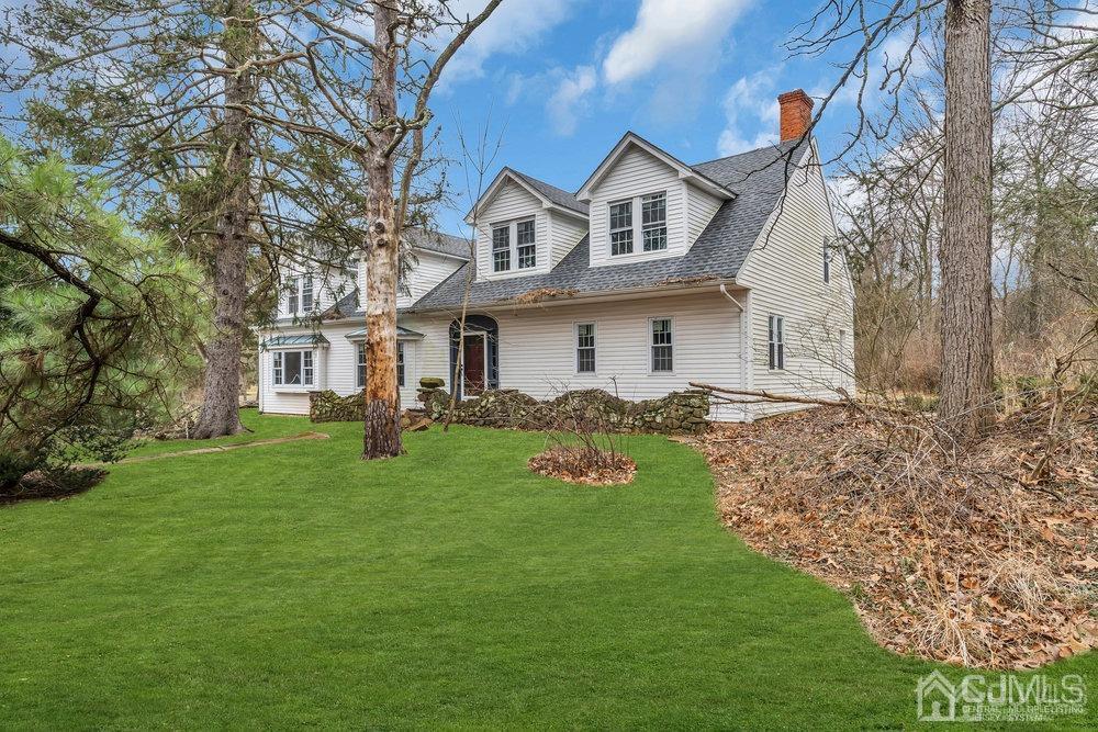 700 Foothill Road Bridgewater, NJ 08807 - Photo 5 of 30 a front view of a house with a garden