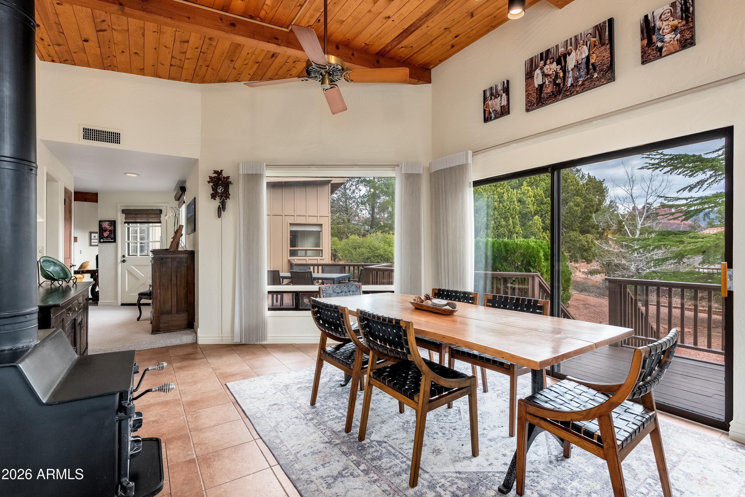 30 Kashmir Road Sedona, AZ 86336 - Photo 11 of 57 a view of a dining room with furniture window and wooden floor