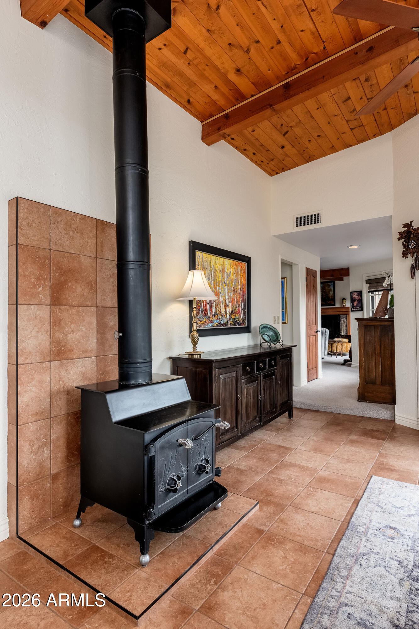 30 Kashmir Road Sedona, AZ 86336 - Photo 12 of 57 a living room with furniture and a flat screen tv