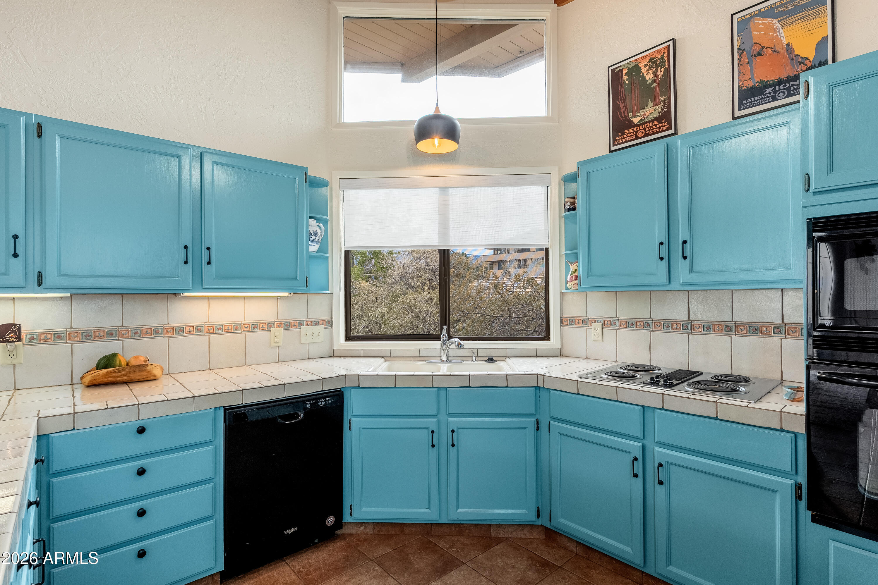 30 Kashmir Road Sedona, AZ 86336 - Photo 15 of 57 a kitchen with cabinets appliances and a sink