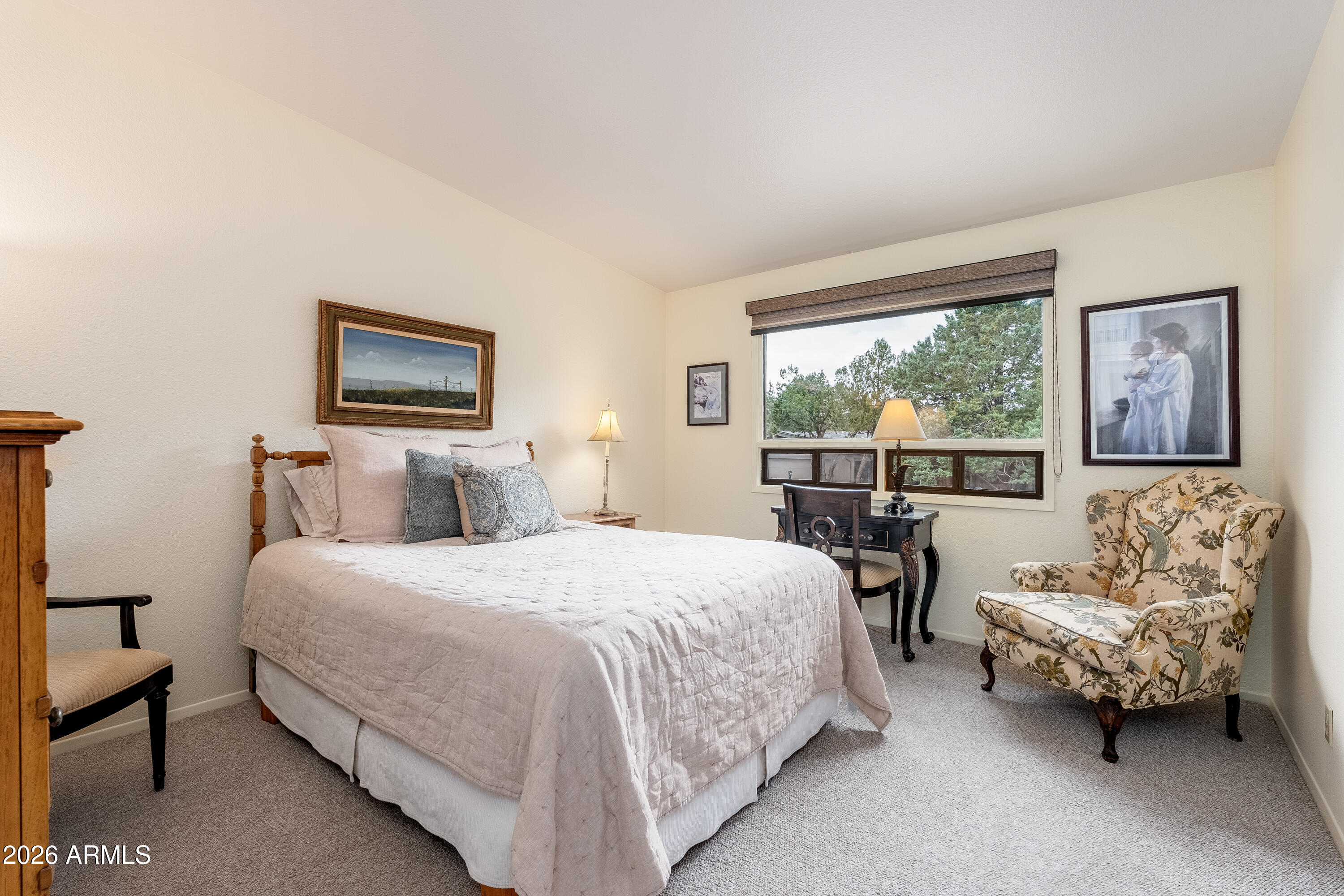30 Kashmir Road Sedona, AZ 86336 - Photo 23 of 57 a bedroom with bed and a large window
