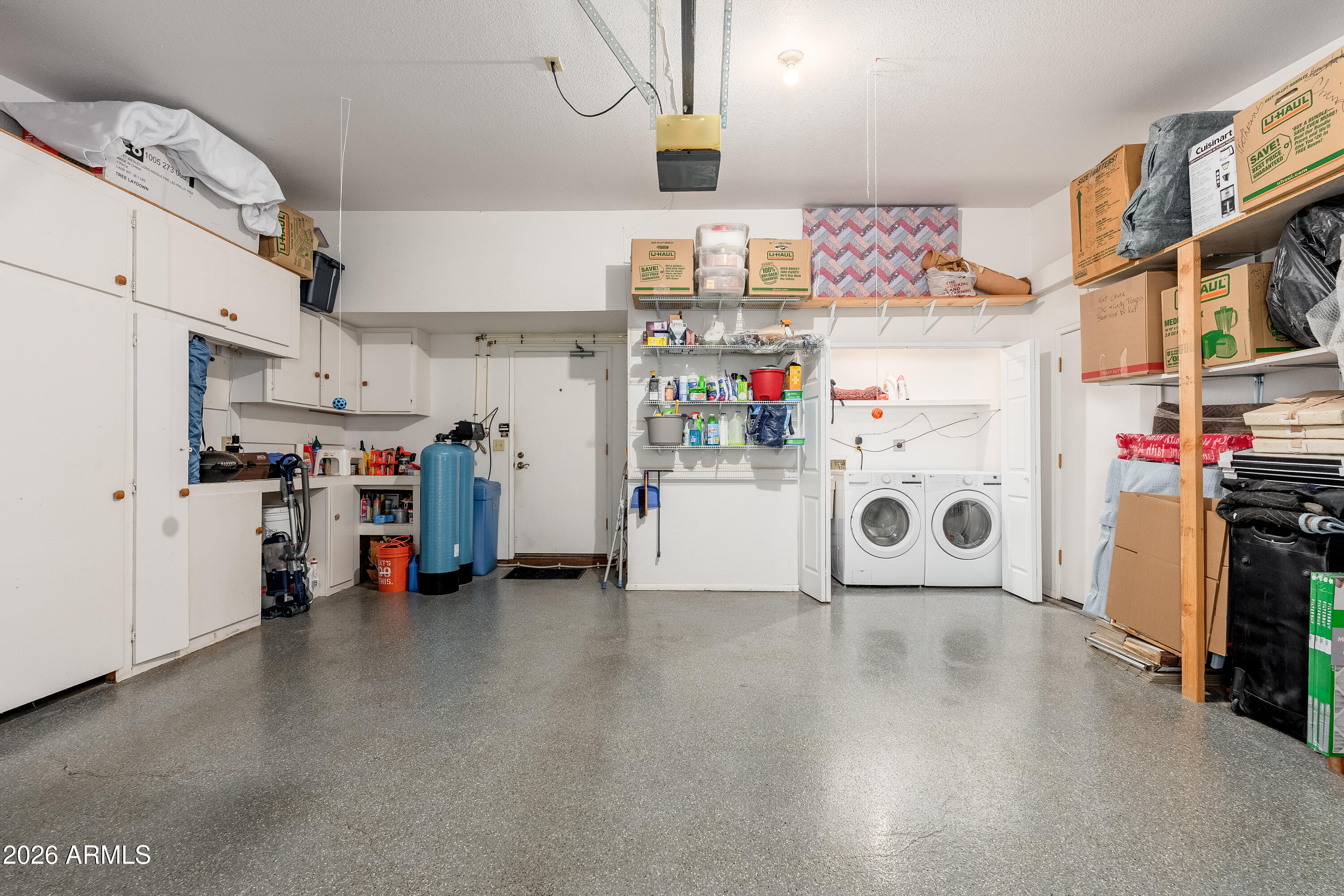 30 Kashmir Road Sedona, AZ 86336 - Photo 33 of 57 a storage room with cabinets and appliances