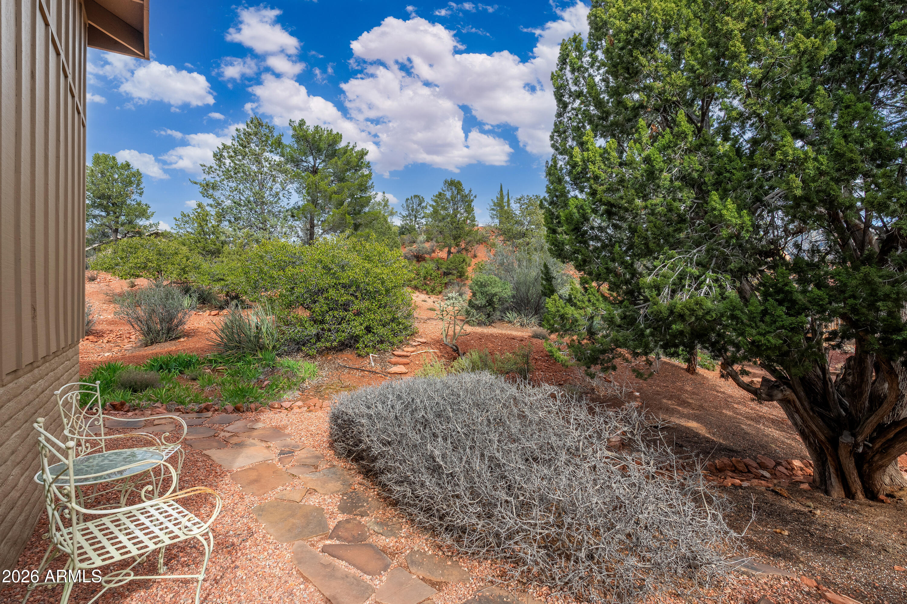 30 Kashmir Road Sedona, AZ 86336 - Photo 41 of 57 a view of a yard with plants and a tree