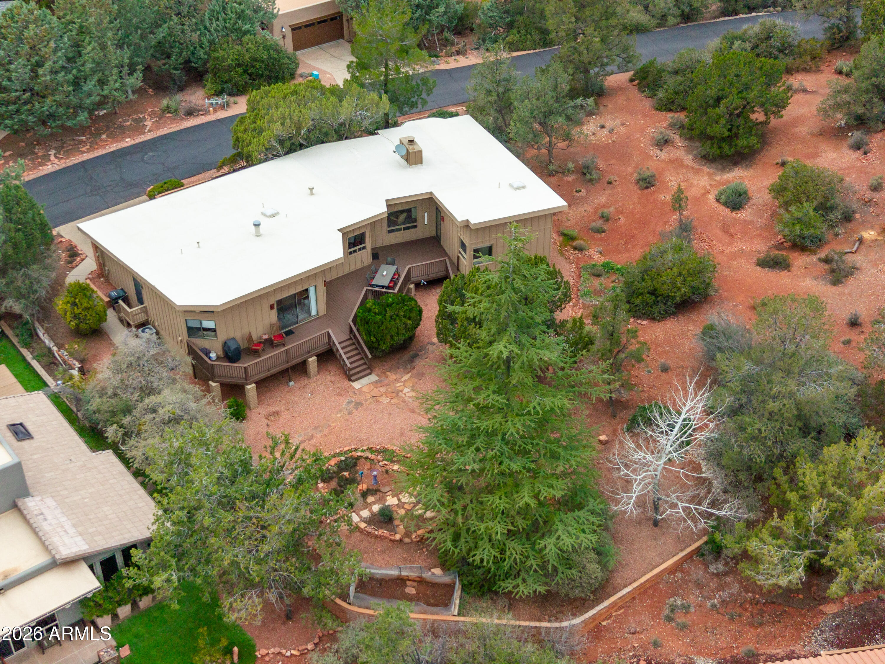 30 Kashmir Road Sedona, AZ 86336 - Photo 49 of 57 an aerial view of a house with yard and outdoor seating