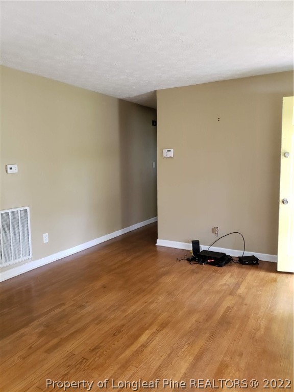 618 Pleasant Loop Fayetteville, NC 28311 - Photo 11 of 25 a view of an empty room and window