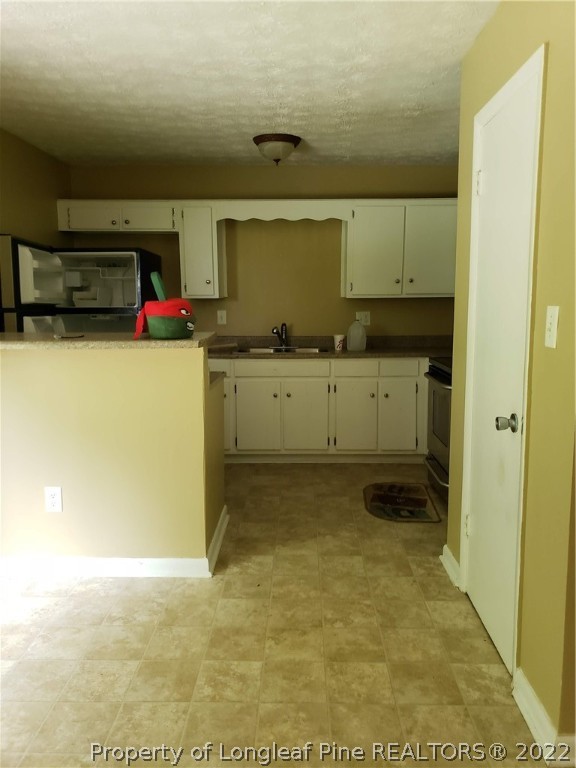 618 Pleasant Loop Fayetteville, NC 28311 - Photo 16 of 25 a room with storage and utility
