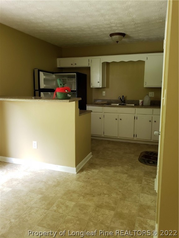 618 Pleasant Loop Fayetteville, NC 28311 - Photo 17 of 25 a room with storage and utility