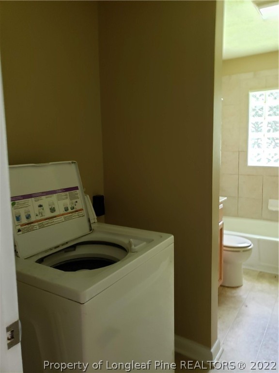 618 Pleasant Loop Fayetteville, NC 28311 - Photo 21 of 25 a utility room with dryer and washer