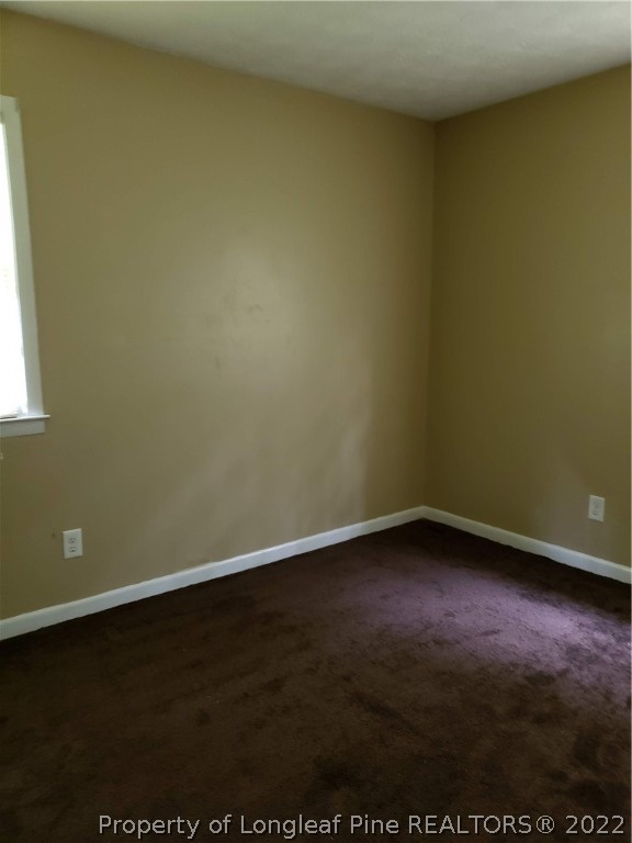 618 Pleasant Loop Fayetteville, NC 28311 - Photo 22 of 25 a view of an empty room and window