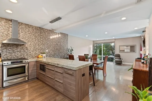 a kitchen with a stove and a sink
