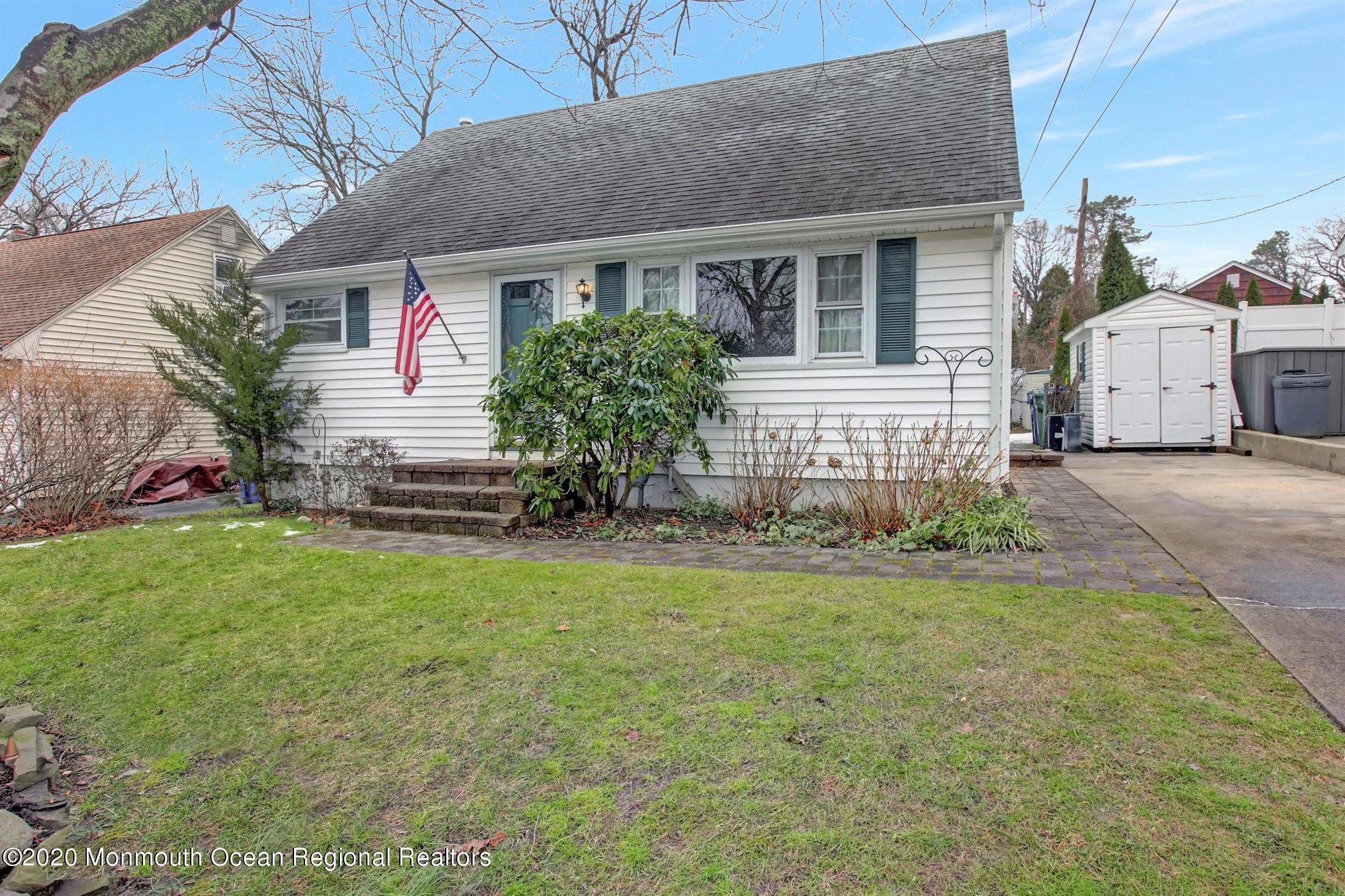 515 Couse Road Neptune Township, NJ 07753 - Photo 3 of 26 a front view of a house with garden
