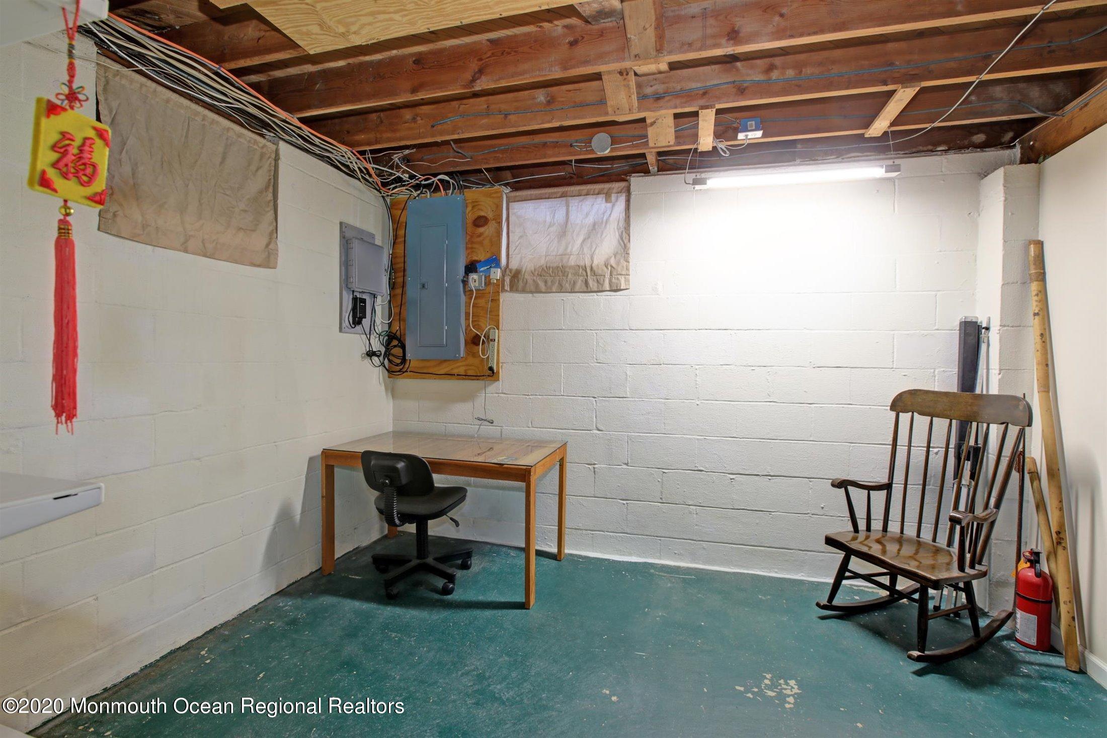 515 Couse Road Neptune Township, NJ 07753 - Photo 22 of 26 a view of a room with gym equipment