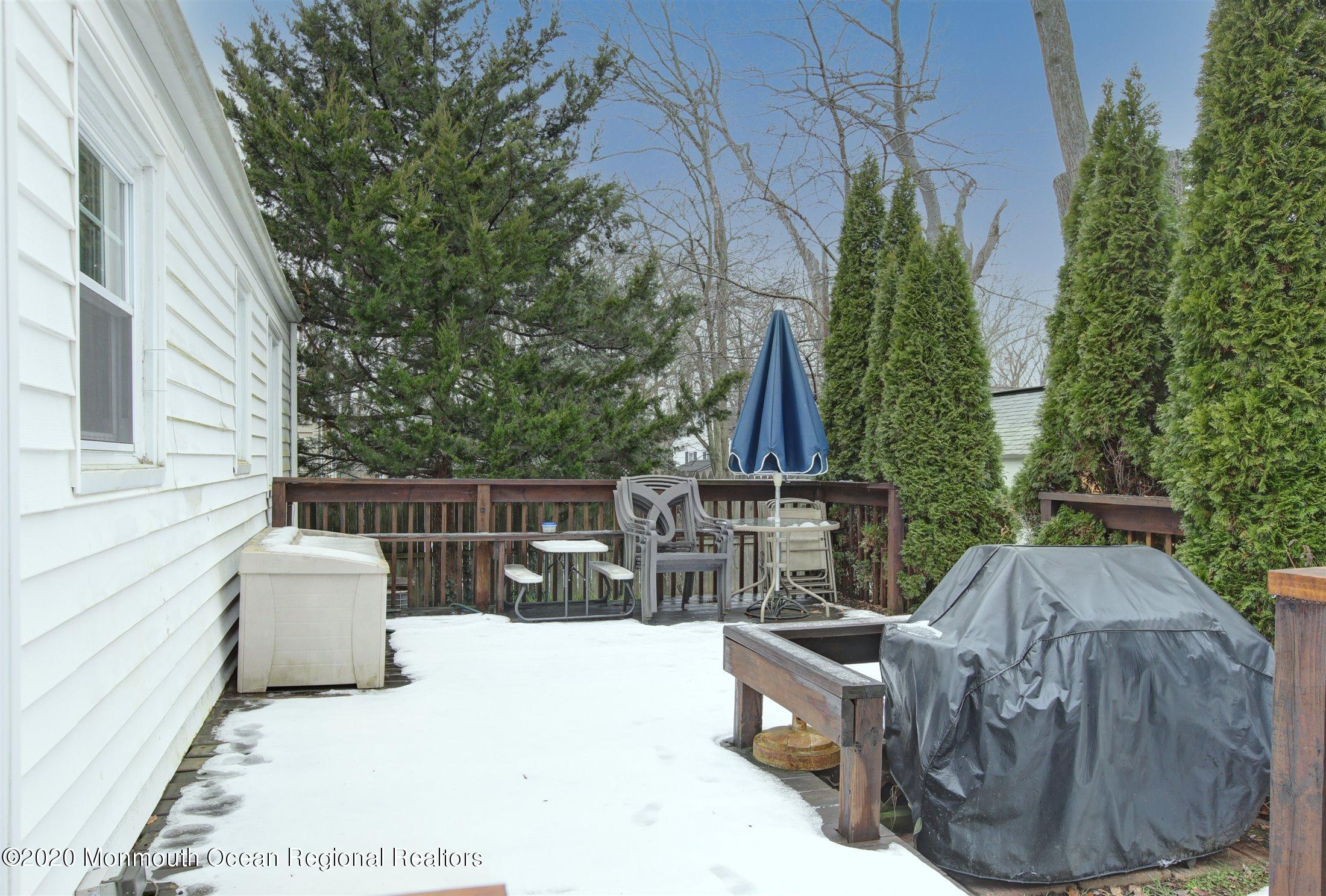 515 Couse Road Neptune Township, NJ 07753 - Photo 23 of 26 a view of roof deck with a barbeque and furniture