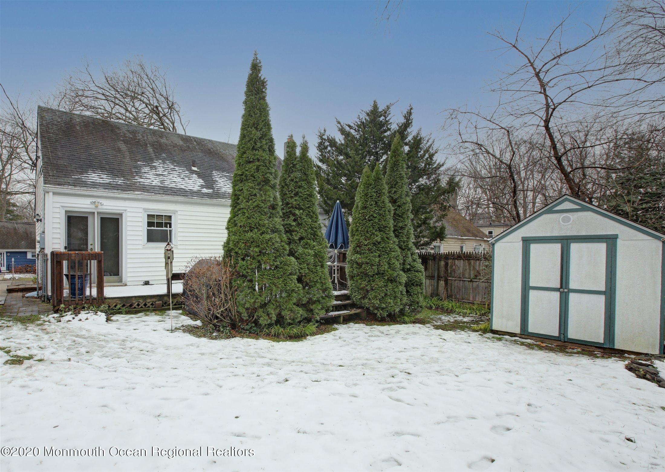 515 Couse Road Neptune Township, NJ 07753 - Photo 25 of 26 a view of a house with a snow in the yard