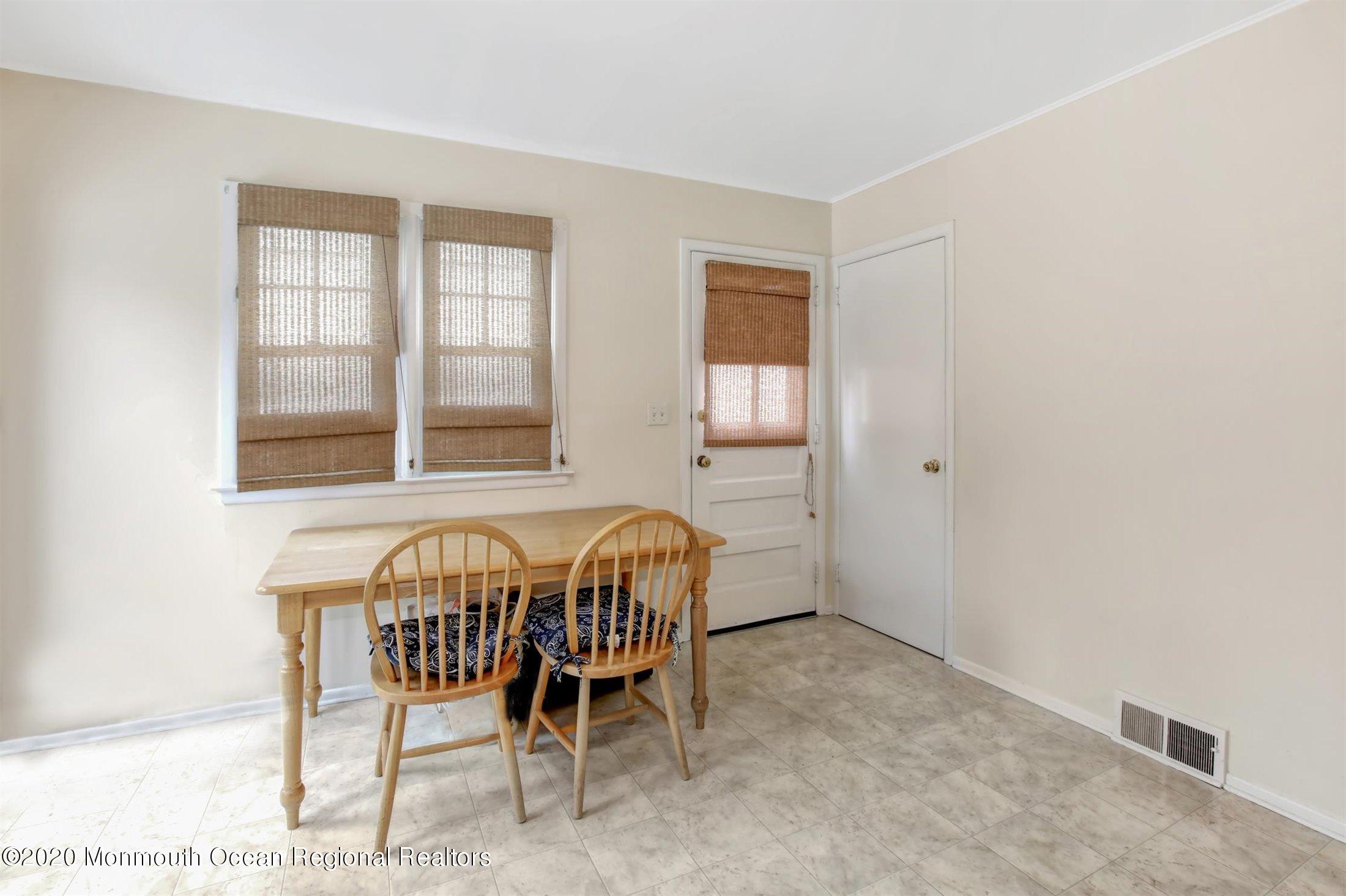 515 Couse Road Neptune Township, NJ 07753 - Photo 9 of 26 a dining room with furniture and windows