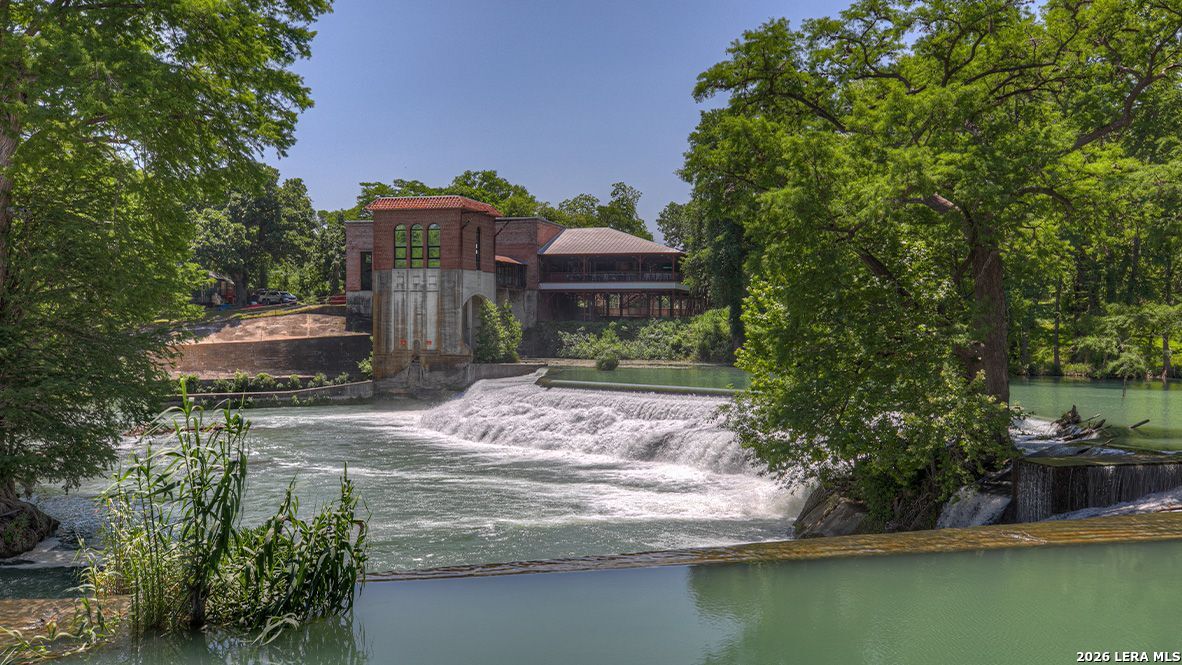1053 Seedling Lane Seguin, TX 78155 - Photo 19 of 20 a front view of a house with a yard and a large tree