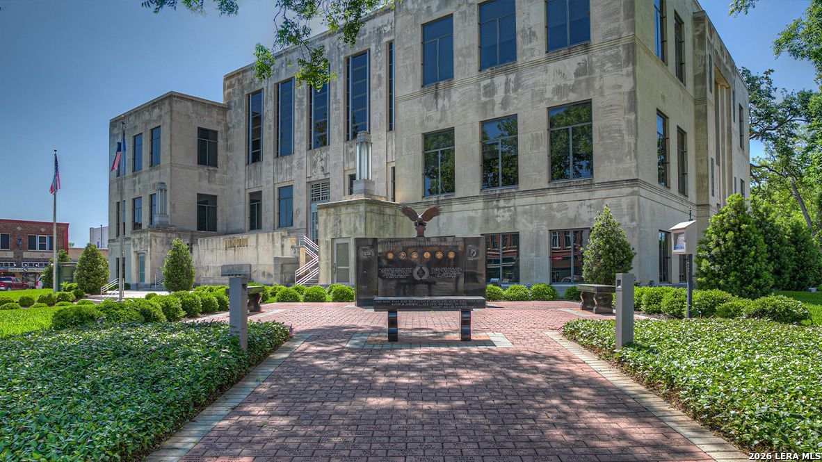 1053 Seedling Lane Seguin, TX 78155 - Photo 7 of 20 a sign on the side of a building