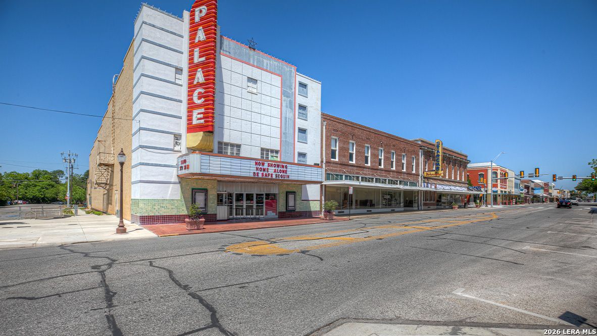 1053 Seedling Lane Seguin, TX 78155 - Photo 9 of 20 a tall building on the side of a street