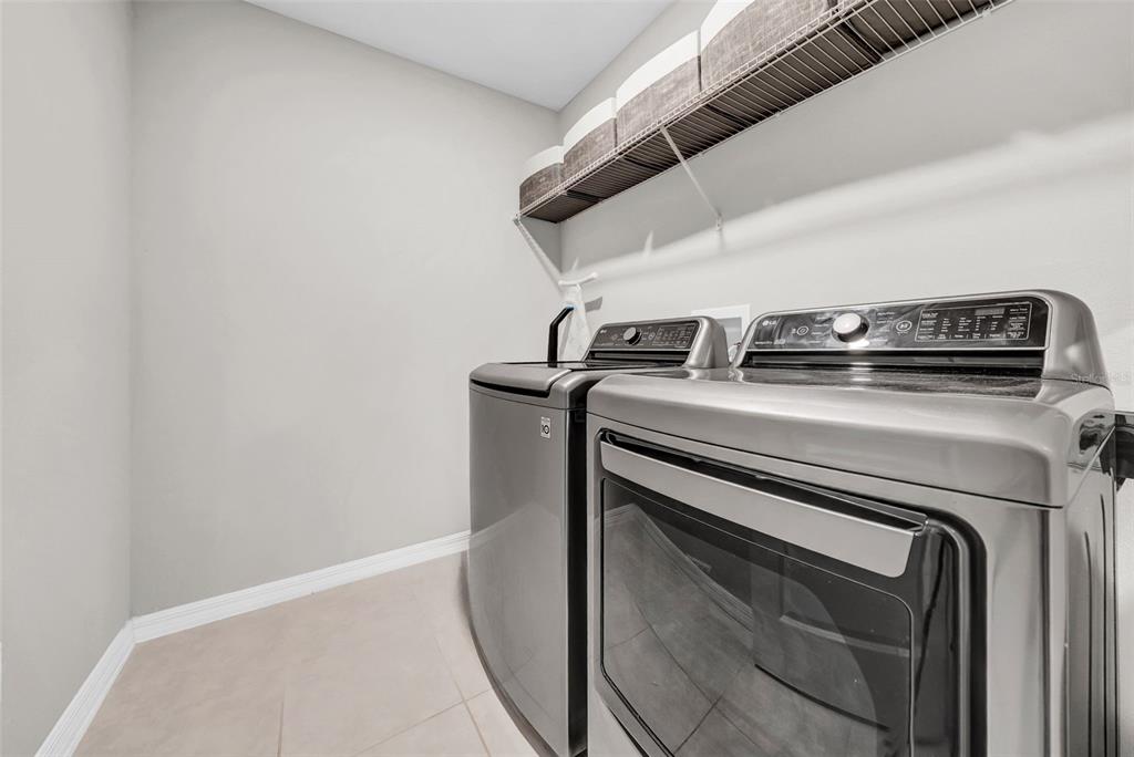 31440 Barrel Wave Way Wesley Chapel, FL 33545 - Photo 40 of 73 a close up view of washer and dryer
