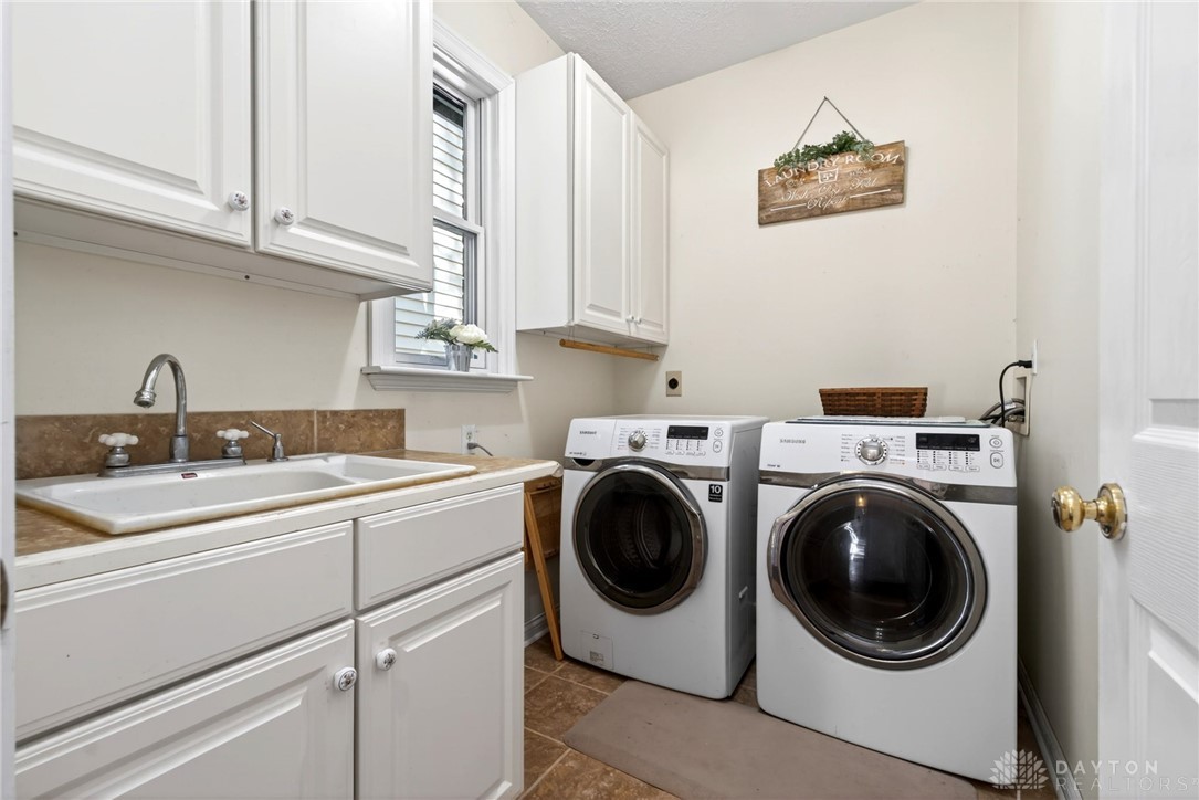 330 South Alpha Bellbrook Road Bellbrook, OH 45305 - Photo 33 of 87 This functional space offers dedicated laundry facilities for effortless chores.