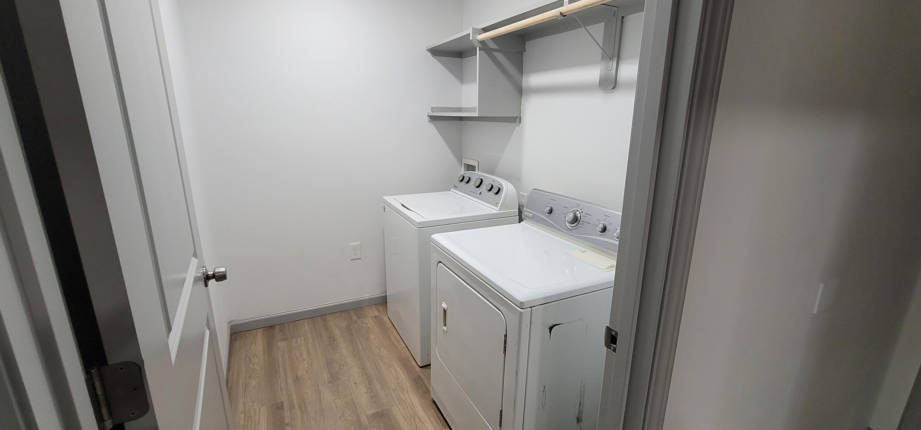 2110 88th Street Lubbock, TX 79423 - Photo 20 of 22 a utility room with dryer and washer