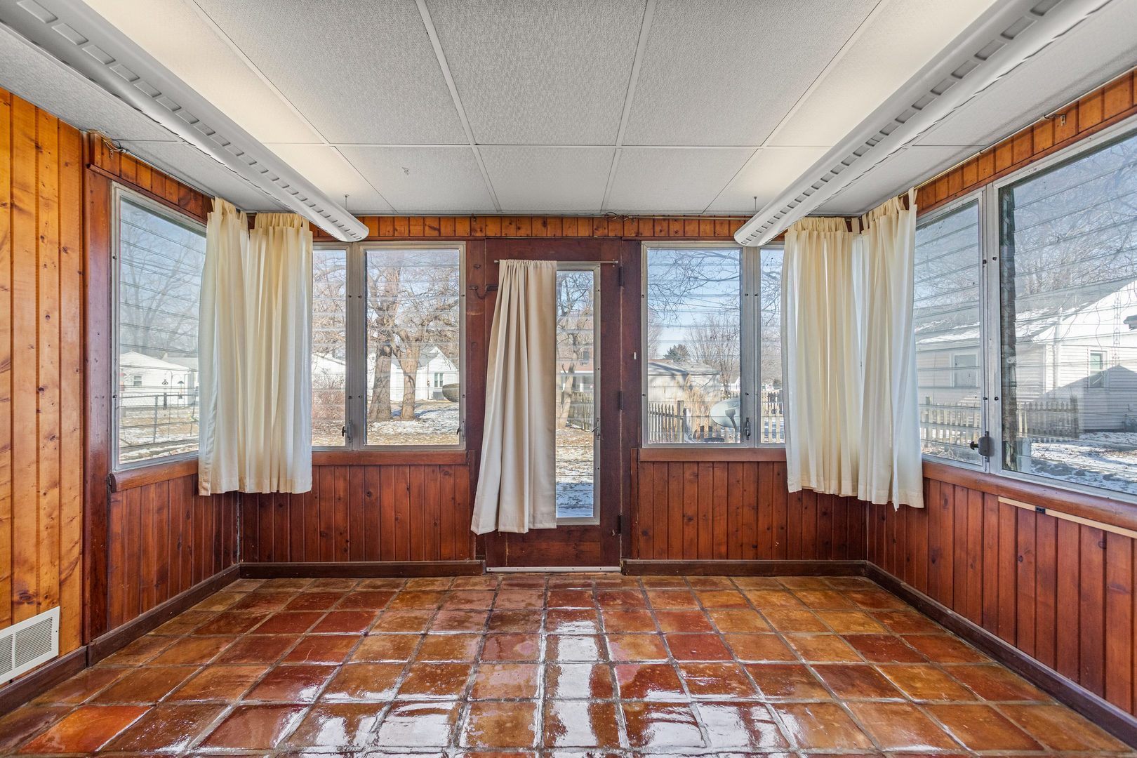 408 Maizefield Avenue Bloomington, IL 61701 - Photo 15 of 28 a view of a room with large windows and furniture