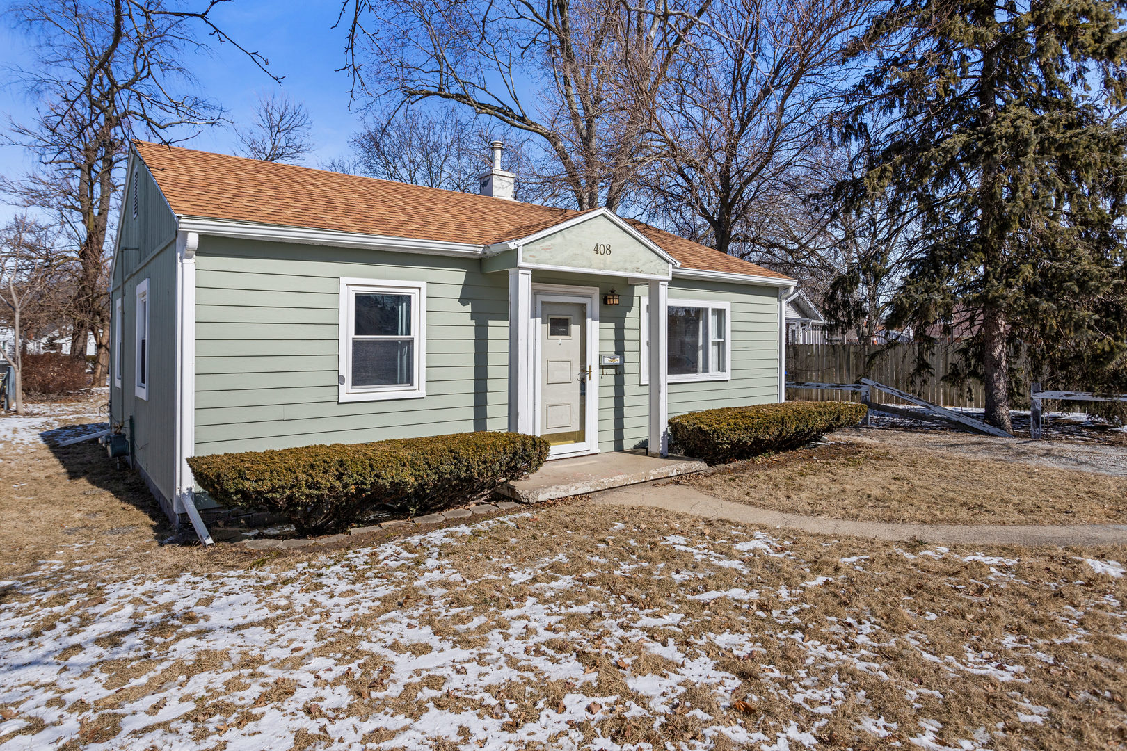 408 Maizefield Avenue Bloomington, IL 61701 - Photo 2 of 28 a front view of a house with a yard