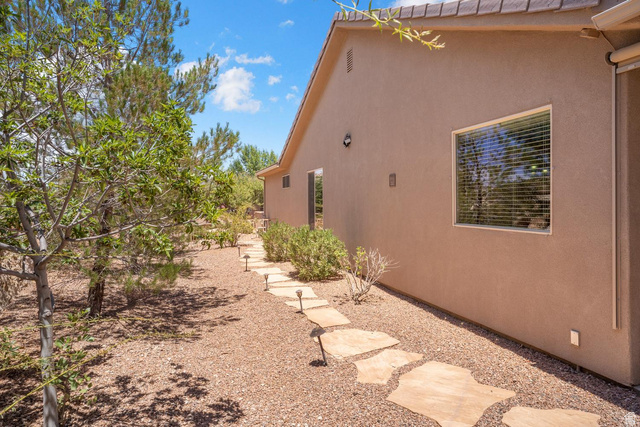 1587 Whitestone Drive St. George, UT 84790 - Photo 23 of 36 Stucco exterior with a tiled roofline