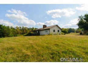 238 Gouges Branch Road Leicester, NC 28748 - Photo 21 of 23 a view of house with yard and entertaining space