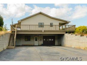 238 Gouges Branch Road Leicester, NC 28748 - Photo 23 of 23 a front view of a house with a yard