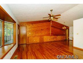 238 Gouges Branch Road Leicester, NC 28748 - Photo 5 of 23 a view of a room with wooden floor