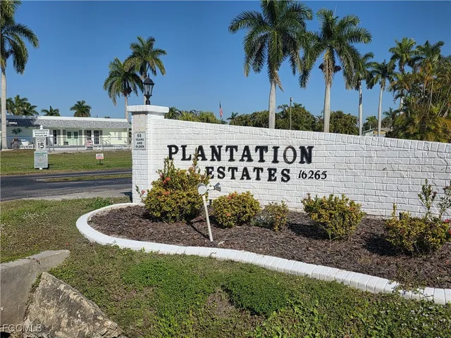 a sign on the side of a road