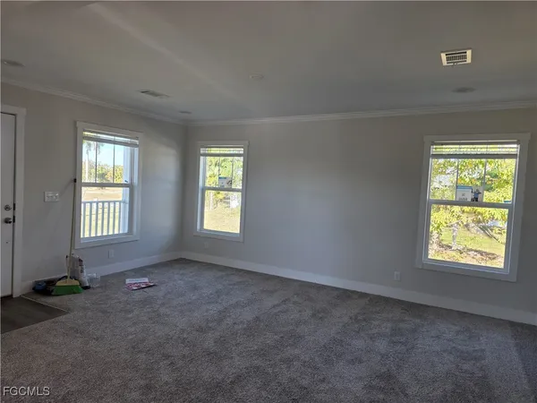 an empty room with windows