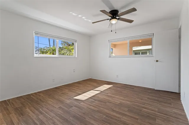 a view of a swimming pool with a yard