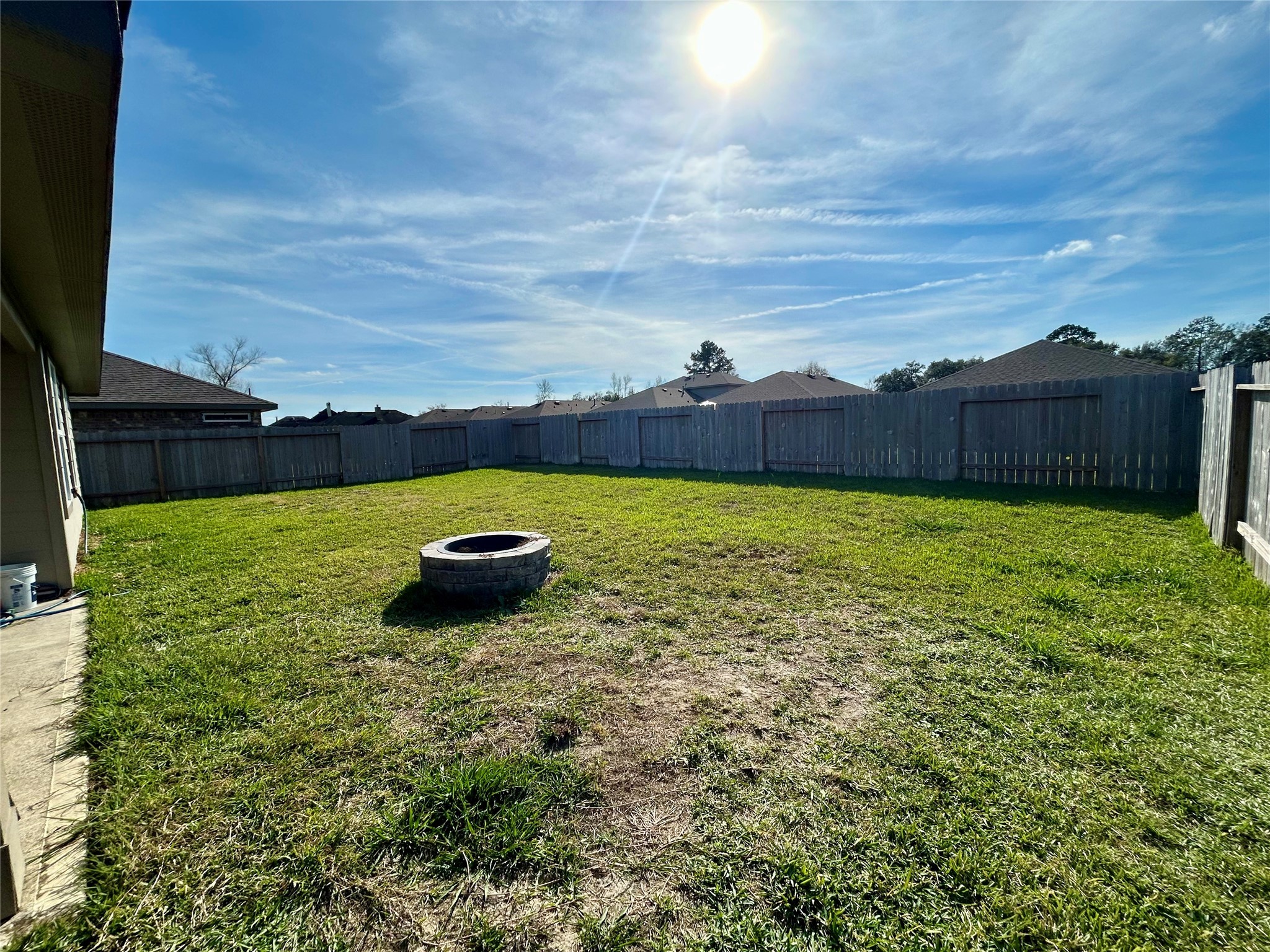 6515 Alexis Street Beaumont, TX 77708 - Photo 12 of 36 a view of a backyard with potted plants