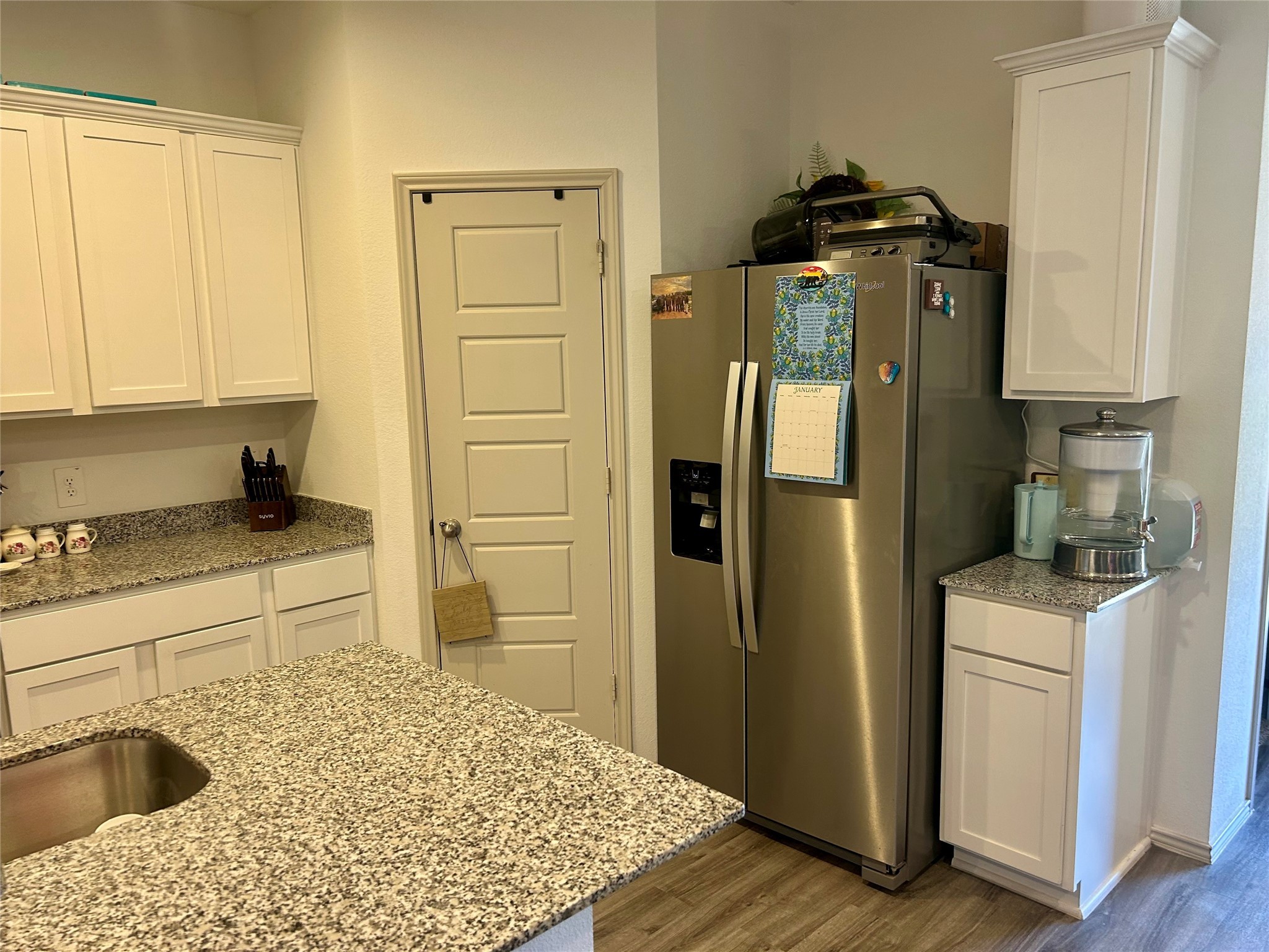 6515 Alexis Street Beaumont, TX 77708 - Photo 16 of 36 a kitchen with a refrigerator and cabinets
