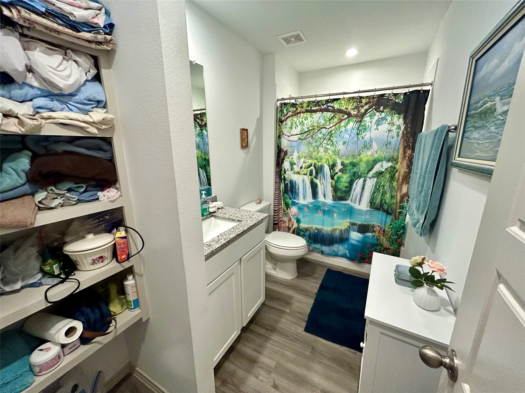 6515 Alexis Street Beaumont, TX 77708 - Photo 22 of 36 a living room with furniture and a floor to ceiling window